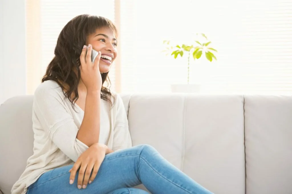 woman smile taking phone call